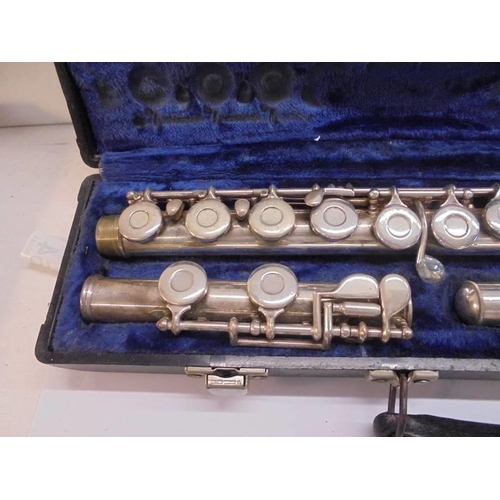 1212 - A cased silver plate flute by Gemeinhardt Elkhart Ltd, M2, C36948.