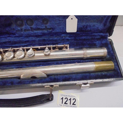 1212 - A cased silver plate flute by Gemeinhardt Elkhart Ltd, M2, C36948.