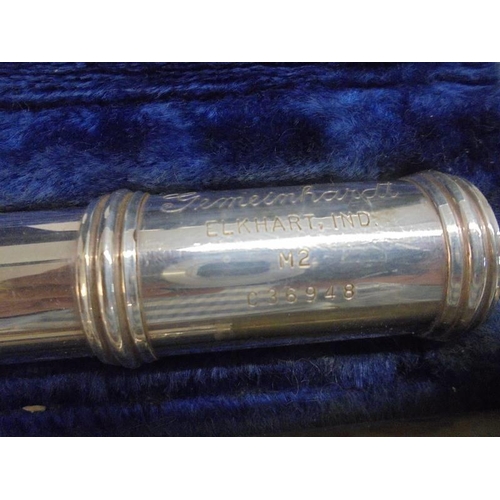 1212 - A cased silver plate flute by Gemeinhardt Elkhart Ltd, M2, C36948.