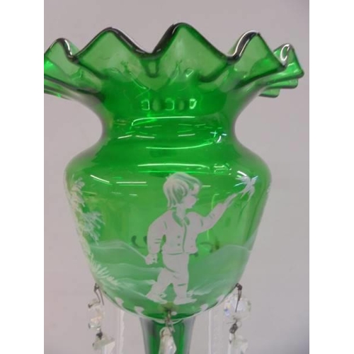 1214 - A 19th century green glass luster with Mary Gregory style decoration.