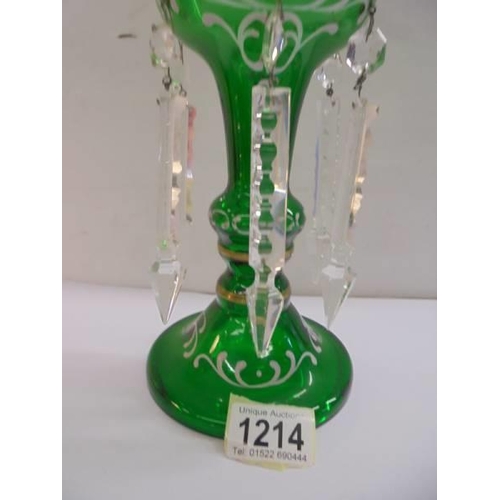 1214 - A 19th century green glass luster with Mary Gregory style decoration.