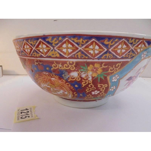 1215 - A 25 cm diameter hand painted Chinese bowl with six symbol signature.