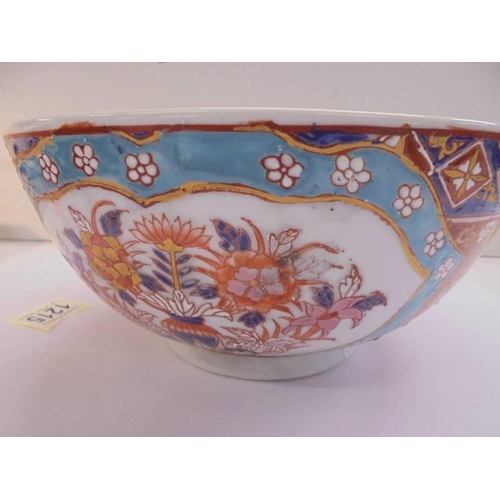 1215 - A 25 cm diameter hand painted Chinese bowl with six symbol signature.