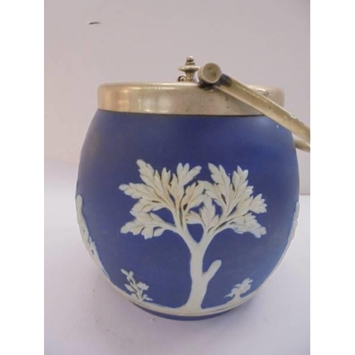 1222 - A Jasper ware biscuit barrel.