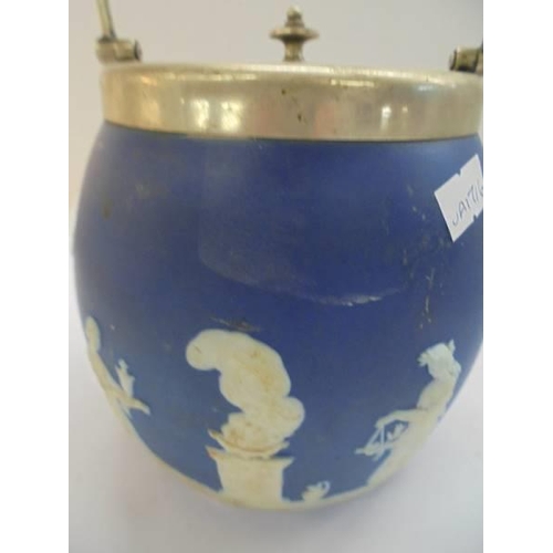 1222 - A Jasper ware biscuit barrel.