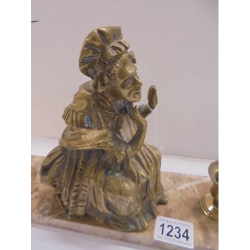 1234 - A brass figure with candleholders on a marble base.