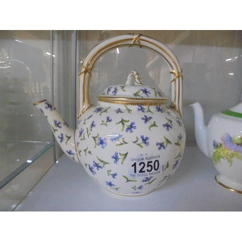 1250 - A Royal Doulton Glamis Thistle teapot and a Goode & Co., London teapot.