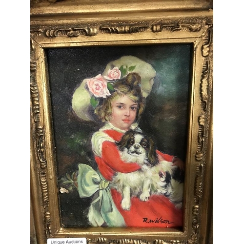 448 - An oil on board of girl with a dog