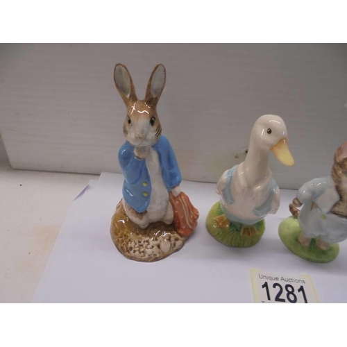 1281 - Four Beatrix Potter and Bunnikins figures.