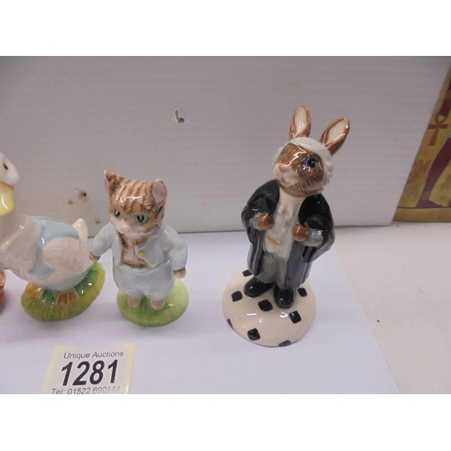 1281 - Four Beatrix Potter and Bunnikins figures.