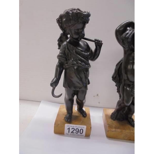 1290 - A pair of bronze 'Wheatsheaf' cherubs on bases, 20cm tall.