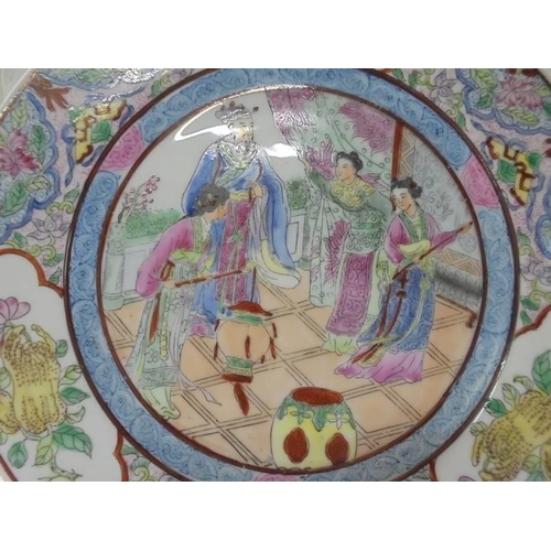 1307 - A hand painted Chinese plate, 26 cm diameter.