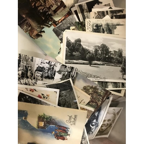 490 - A mixed quantity of postcards, photos and greeting cards