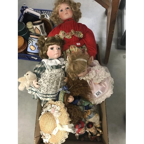 525 - A collection of porcelain dolls and teddies