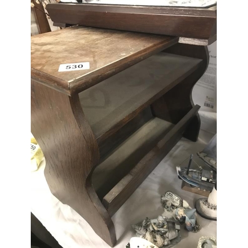 530 - A wooden magazine rack / table