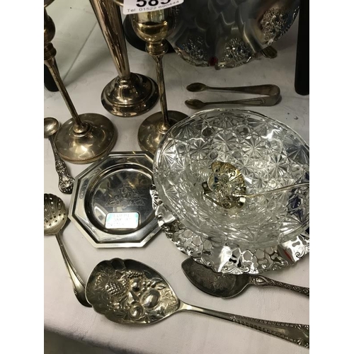 585 - A quantity of silver-plated items