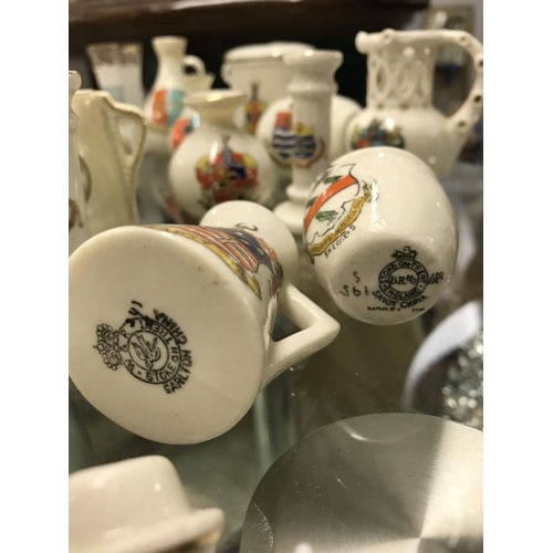 586 - A quantity of ceramic items with city and town crests