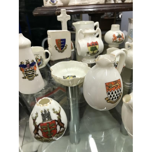 586 - A quantity of ceramic items with city and town crests