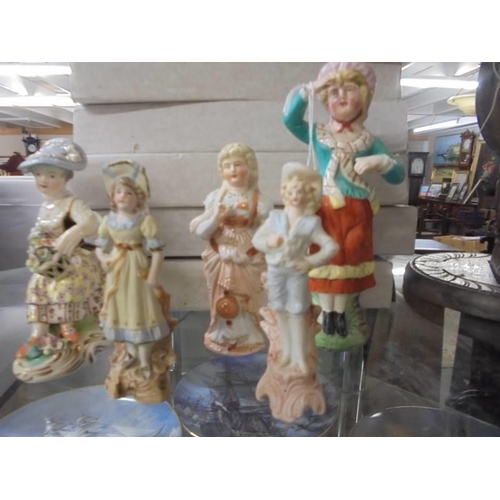 1404 - Seven assorted porcelain figures, one a/f.