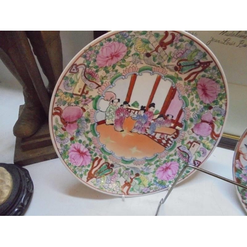 1428 - A hand painted Chinese dish and two hand painted Chinese plates.