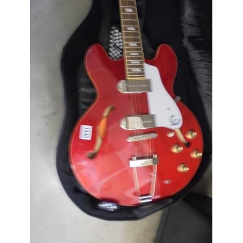 1440 - A six string Epiphone electric guitar, red design with Ritter case and Blackstar amp. COLLECT ONLY.