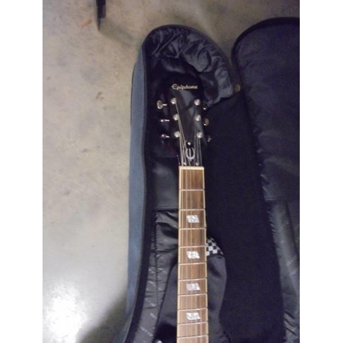 1440 - A six string Epiphone electric guitar, red design with Ritter case and Blackstar amp. COLLECT ONLY.