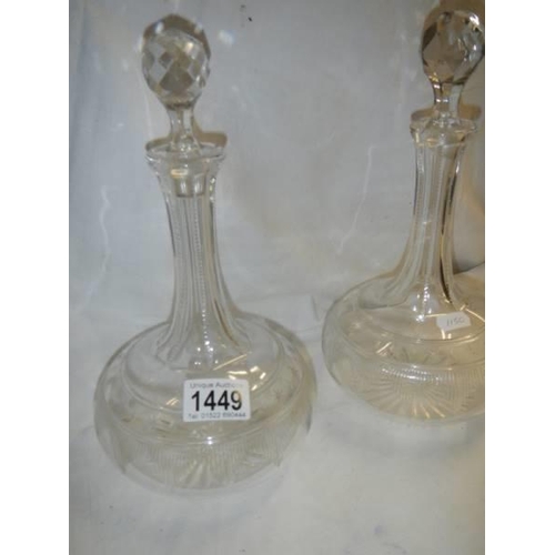 1449 - A pair of early 20th century glass decanters.