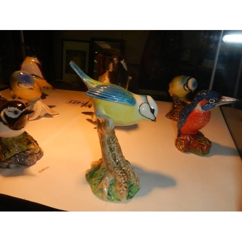 1452 - Nine assorted bird figures including Beswick.