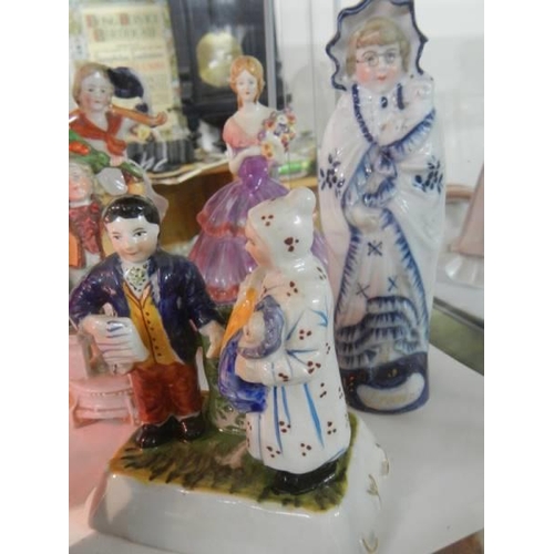 1456 - A 19th century Staffordshire figure group, a 'Mr Swamp' jug and other figures.