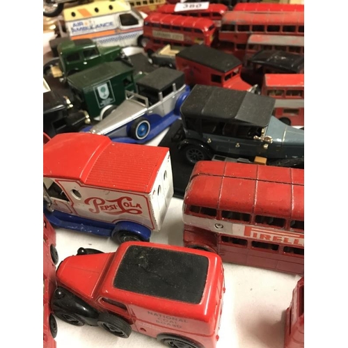 380 - A collection of approx. 32 die cast cars, buses and motor bikes