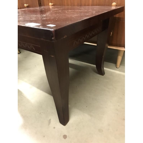 634 - A small dark wooden table