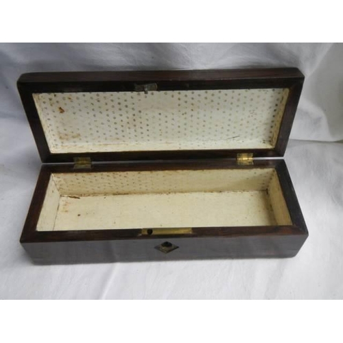 1506 - An early 20th century rosewood glove box.