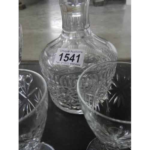 1541 - A cut glass decanter and six glasses.