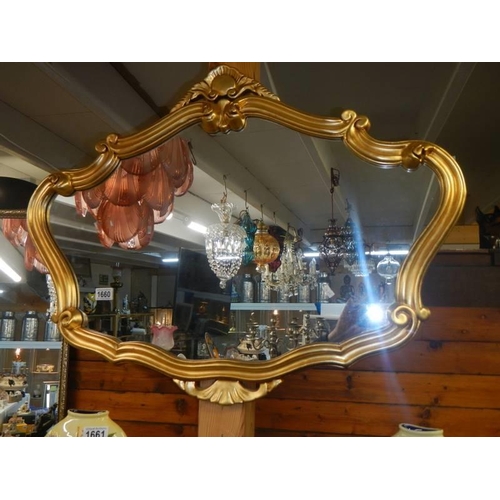 1660 - A nice shaped gilt framed mirror, COLLECT ONLY.