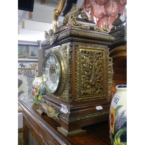 1672 - An excellent Victorian brass mounted mantel clock in working order.