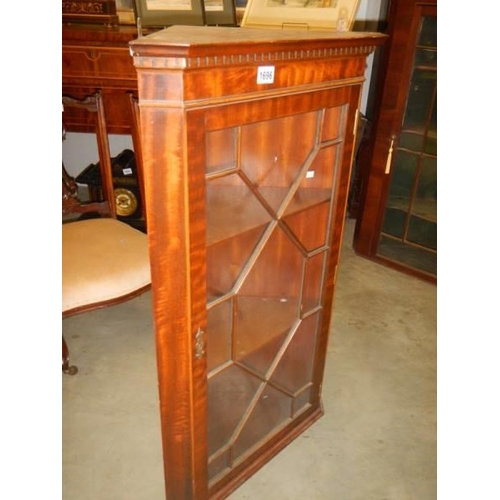 1696 - An early 20th century glazed corner cupboard with dental cornice, COLLECT ONLY.