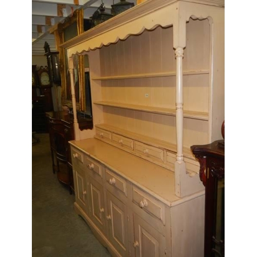 1704 - An early painted four door pine dresser. COLLECT ONLY.