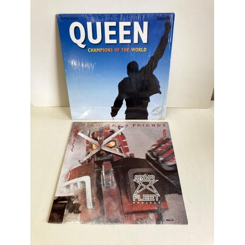 372 - A quantity of Queen LPs, 12In singles & Laser disc