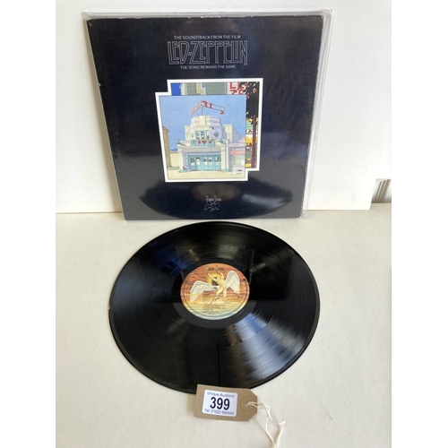 399 - Led Zeppelin, Song Remains The Same with booklet. Vinyl V-good+. Gatefold.