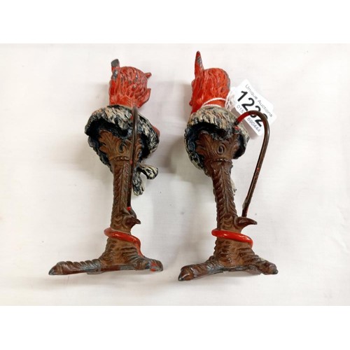 1232 - A pair of Austrian Devil candlesticks (one horn on each devil is missing or damaged).