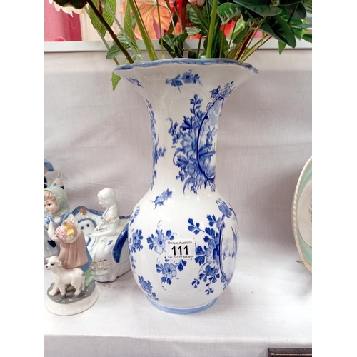 111 - A blue & white vase depicting Dutch scene