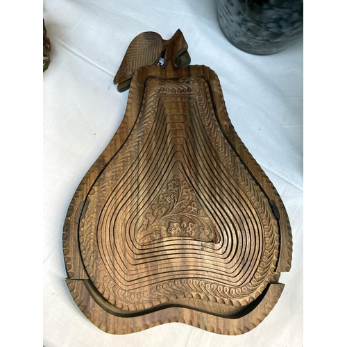 14 - A wooden metamorphic fruit bowl shaped as a pear