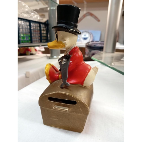 170 - A vintage Disney Scrooge Mcduck Sheffield trustee savings bank TSB money box with key