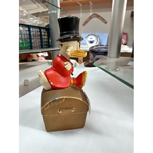 170 - A vintage Disney Scrooge Mcduck Sheffield trustee savings bank TSB money box with key