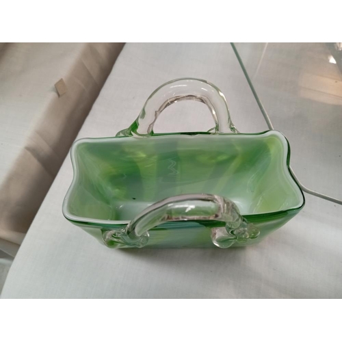 173 - An art glass handbag by Laguna. Height 15cm