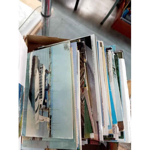 196 - A quantity of postcards