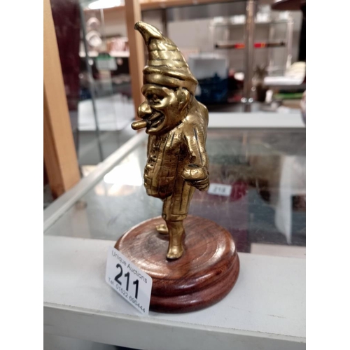 211 - A Victorian brass Mr Punch figure. Height 12.5cm