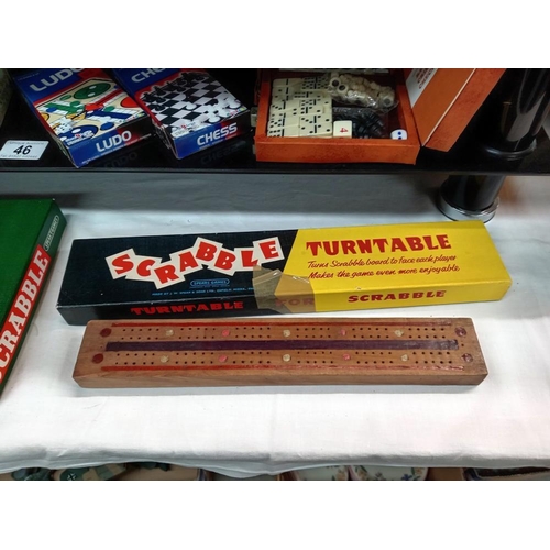 46 - A quantity of games including Scrabble & cribbage board