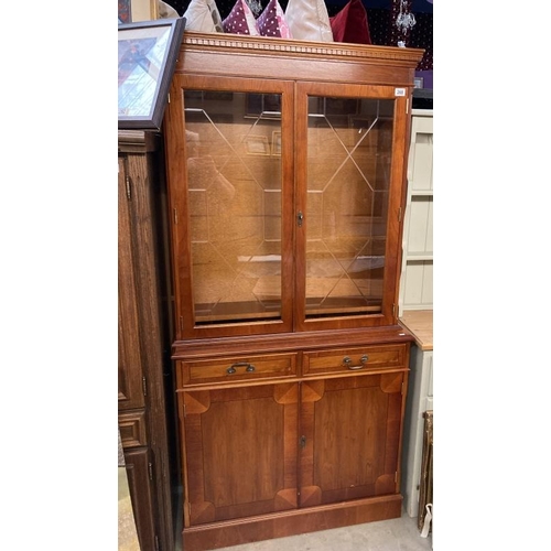 268 - A reproduction mahogany effect display dresser, glazed etched doors with two drawers and cupboards 1... 