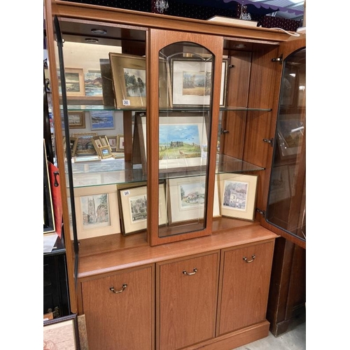 271 - A teak effect part  glazed dresser,  Etched glass, interior lighting and mirror back  with internal ... 